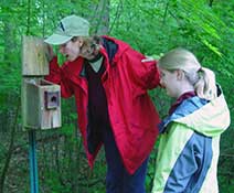 mollie and helen with nestbox at Woodend