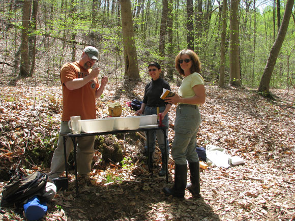 3---Bob-Smith-explains-his-doctoral-research-on-caddisflies-at-Dark-Branch-to-Debra-and-Gale